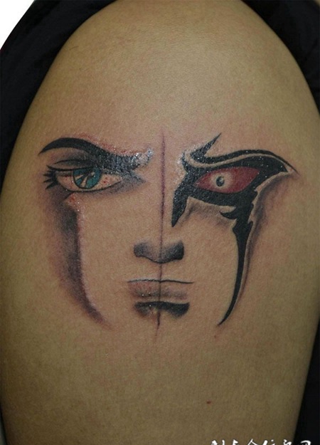 胳膊上的一念之间人脸纹身