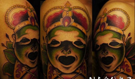 胳膊上的小鬼纹身