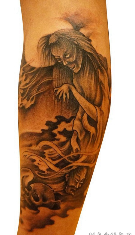 小腿上的恶鬼纹身