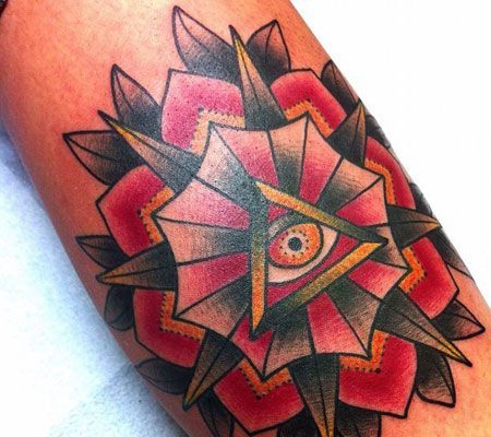 手臂上的梵花上帝之眼纹身图片