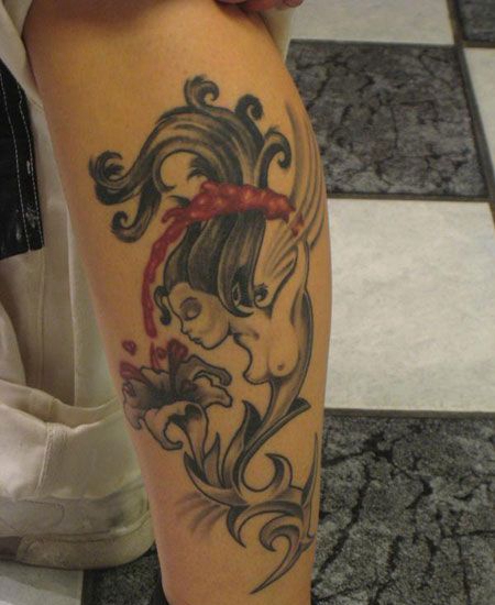 小腿花朵精灵纹身图案