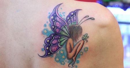 背部彩色蝴蝶精灵纹身图案