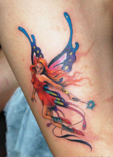 大臂彩色蝴蝶美女精灵纹身图案