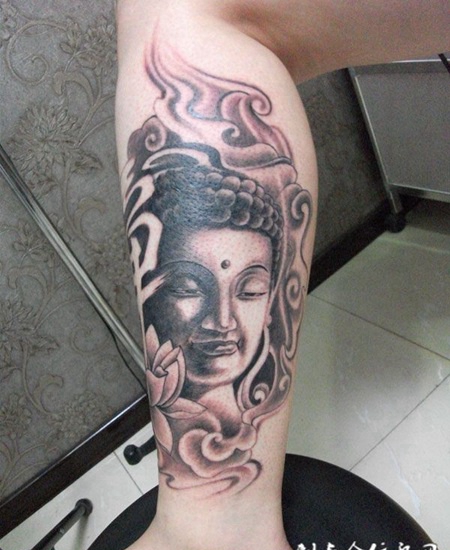 小腿上的佛像纹身