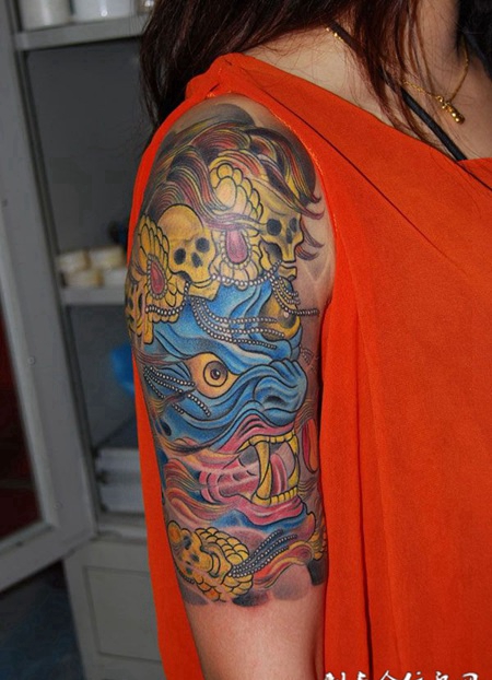 胳膊上的大黑天纹身