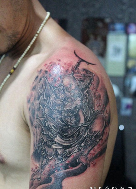 胳膊上的金刚罗汉纹身