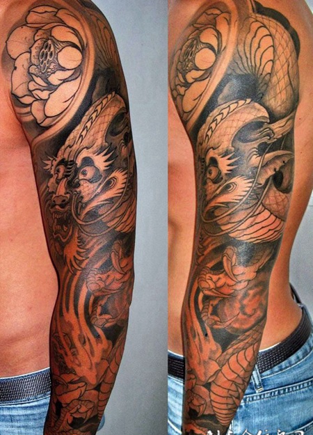 胳膊上的莲花龙纹身