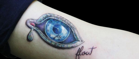 手臂眼睛时钟纹身图案