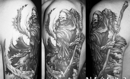 胳膊上的死神骷髅的纹身