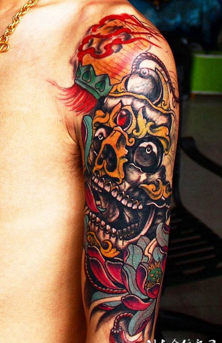 胳膊上的嘎巴拉莲花纹身