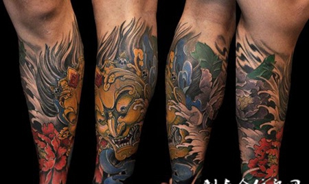 小腿上的传统大黑天牡丹纹身