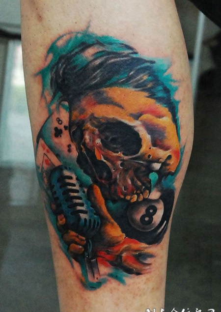 小腿上的骷髅麦克风纹身