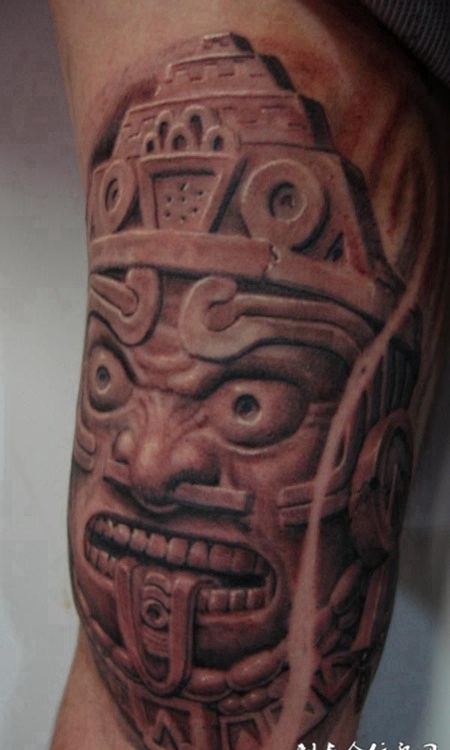 胳膊上的石刻罗汉纹身