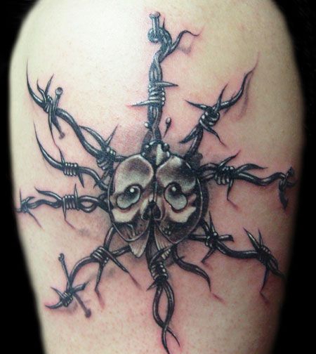 手臂上的荆棘甲壳虫纹身图案