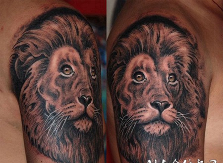 大臂狮子头纹身