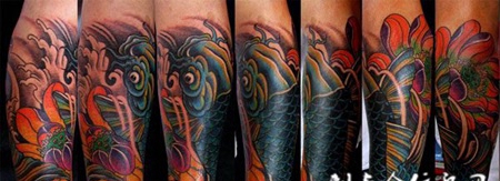 小臂鲤鱼莲花纹身