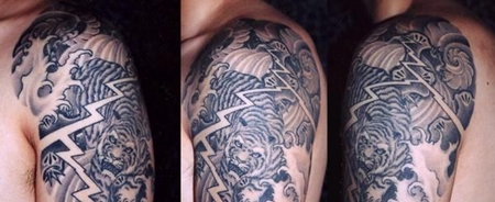 大臂下山老虎纹身图案