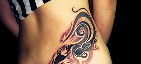 侧腰妩媚的狐狸纹身图案