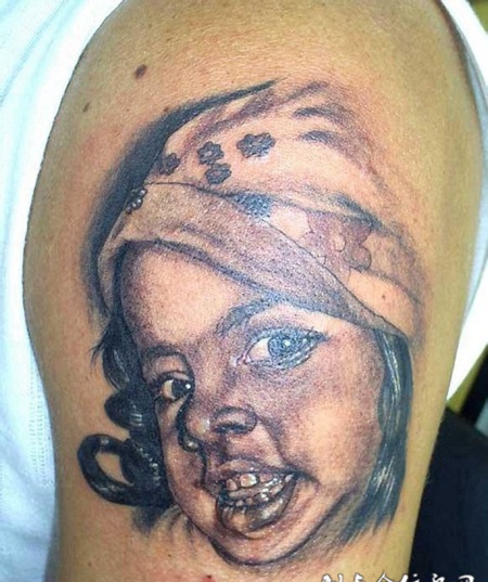 大臂娃娃肖像纹身图案