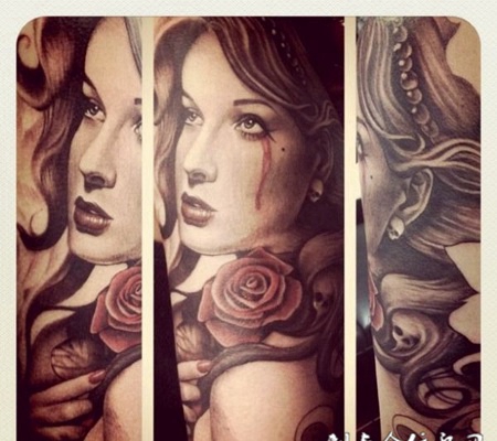 大臂流血泪的美女纹身图案