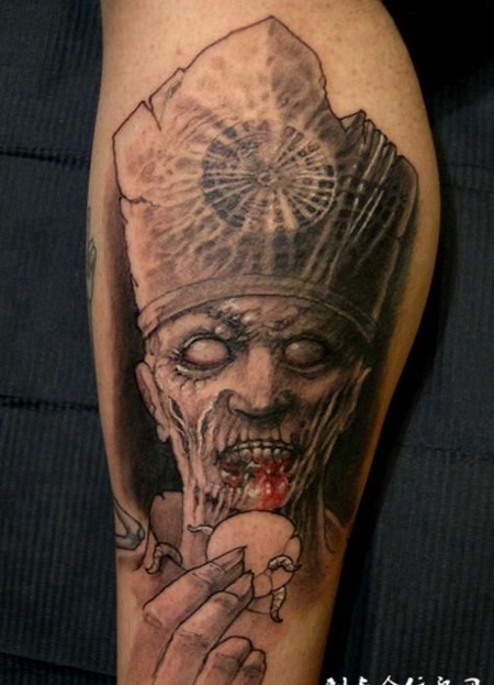 小腿上进食的恶魔纹身图案