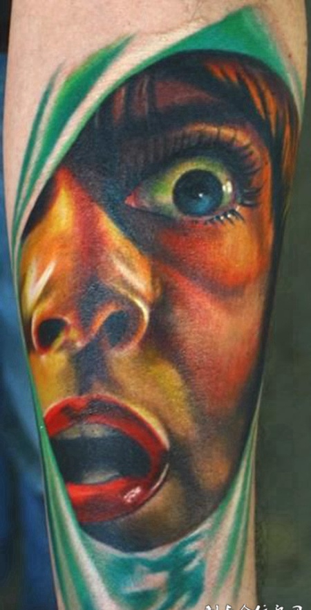 小臂半面人纹身图案