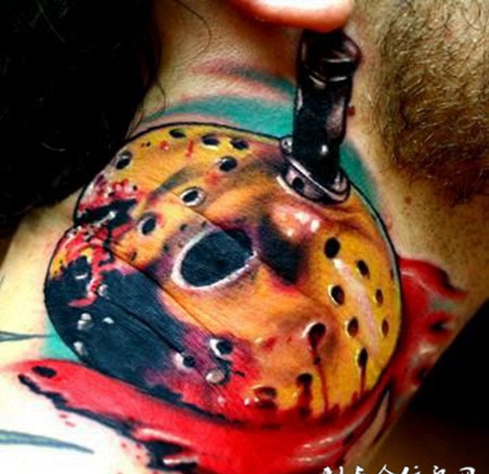 脖子上插着匕首的面具纹身图案