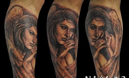 小臂上长着翅膀的美女纹身图案