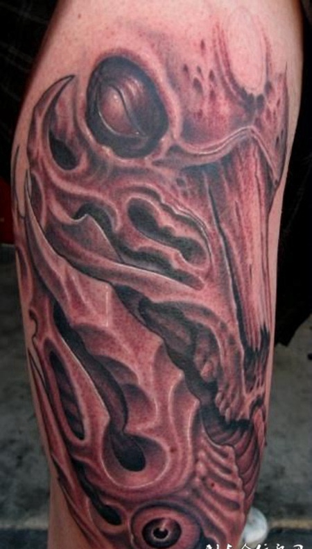 大腿上的骨骼骷髅纹身图案