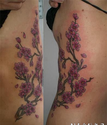 一枝桃花出墙来腰部纹身