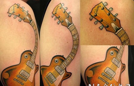 肩膀上的吉他纹身图案