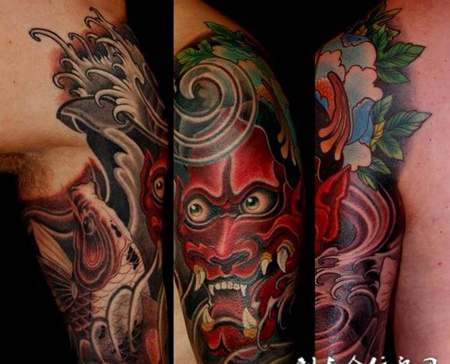 大臂上的般若鲤鱼纹身图案