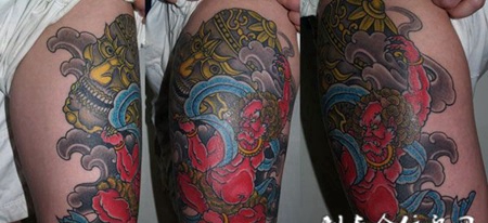 大腿上的嘎巴拉风神纹身图案