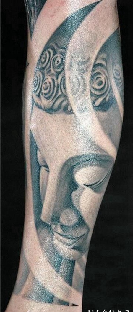 小腿上的佛像的纹身图案