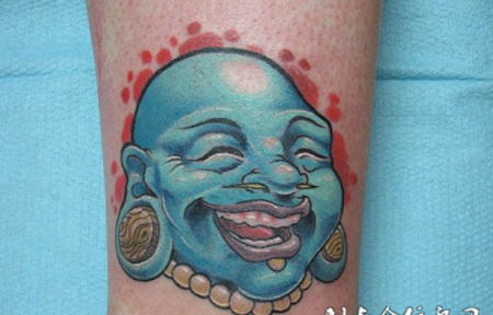 小臂上的佛头纹身图案