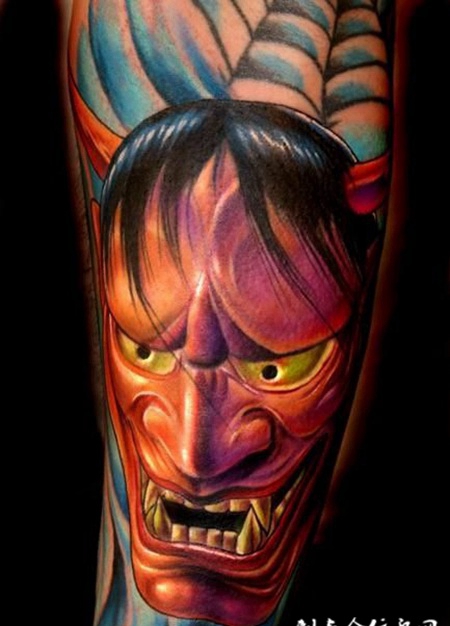 小臂上的蜘蛛网般若纹身图案