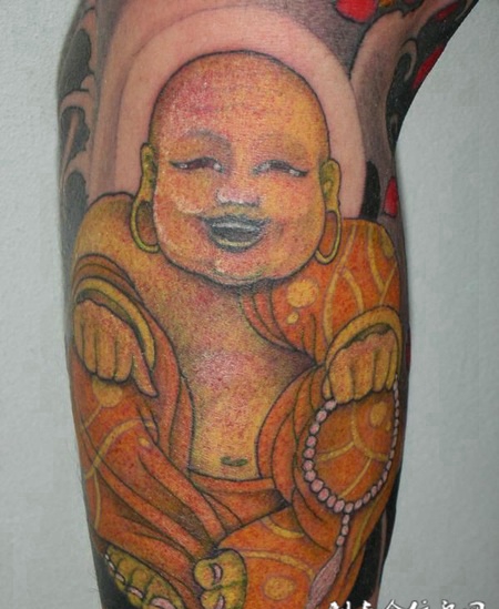 小臂上的佛像纹身图案