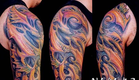 大臂上的骨质骨骼纹身图案