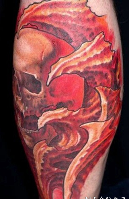 小腿上的机械骷髅纹身图案