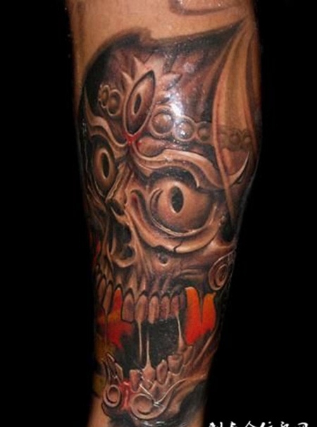 小腿上的嘎巴拉纹身图案