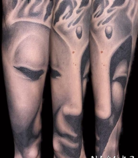 小腿上的佛像纹身图案