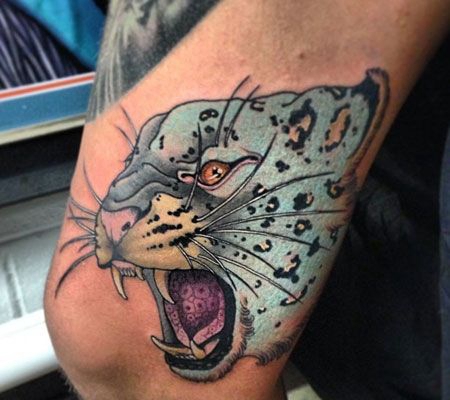 大腿卡通猎豹头纹身图案