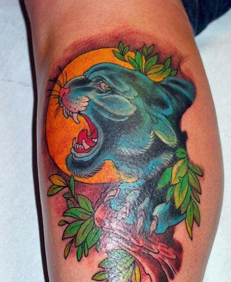 小腿蓝色猎豹头纹身图案