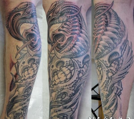 小腿上的机械骨骼纹身图案