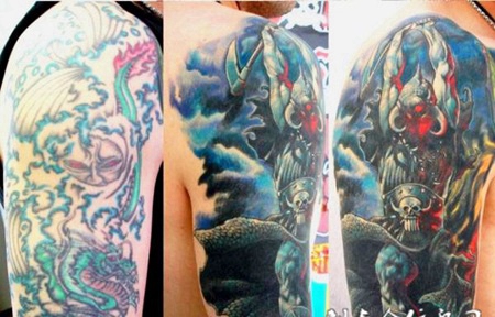 大臂上的恶魔战士纹身图案