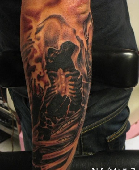 小臂上的死神纹身图案