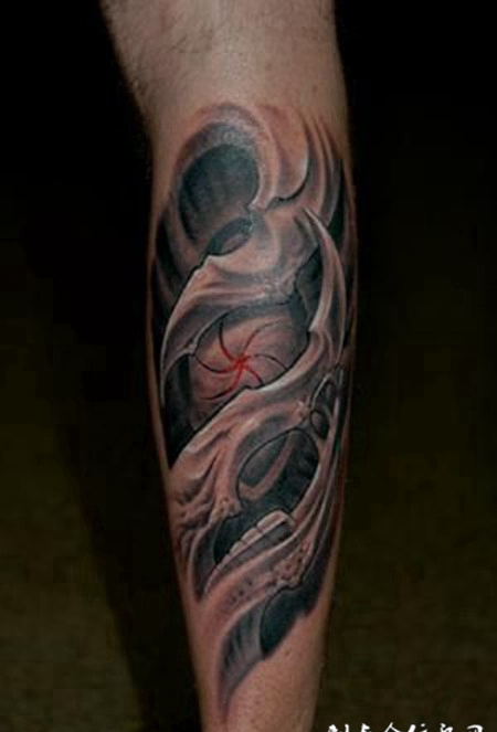 小腿上的骨质触角纹身图案