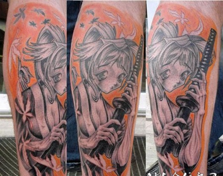 小腿上的卡通手枪纹身图案