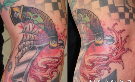 大臂上的刀柄纹身图案