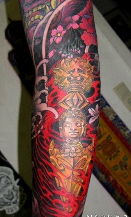 小臂上的金刚杵佛杵纹身图案